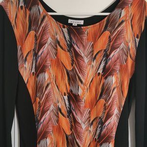 Adore Women's Black with Red/Orange Feather Print Tunic Top